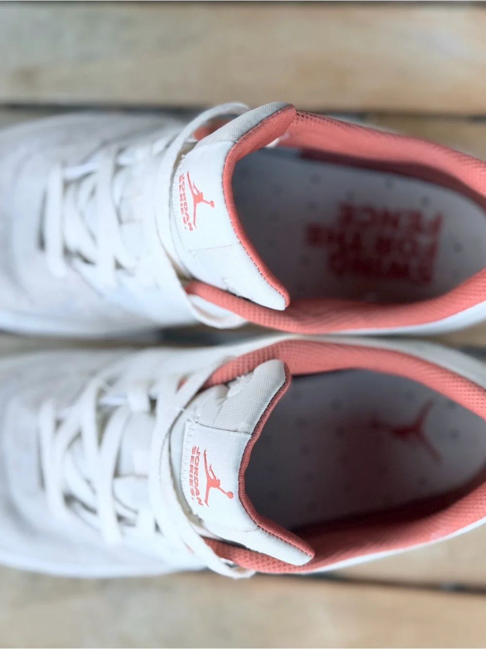 Jordan White and Pink Low-Top Sneakers